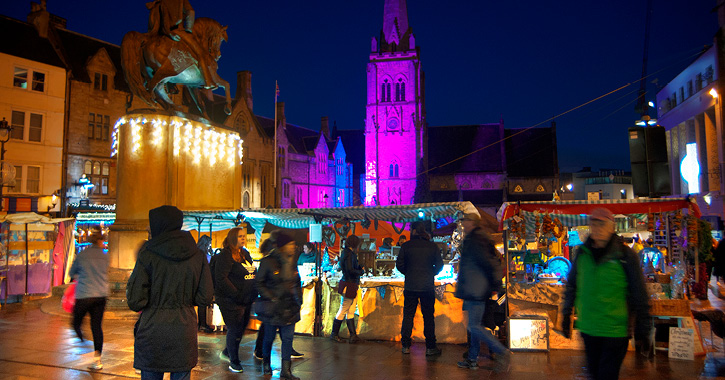 View of Durham Market Place with stalls and people during the annual Christmas Festival